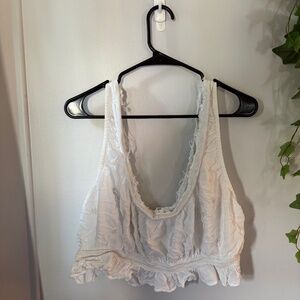 Free People NWOT!! Beautiful, raw-hem, embroidered top